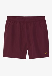 Burgundské športové šortky s elastickým pásom, bočnými vreckami a malým žltým logom na spodnom pravej strane. Hladká, ľahká tkanina.