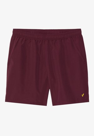 Burgundijas sporta šorti ar elastīgu jostasvietu, sānu kabatām un mazu dzeltenu logotipu apakšējā labajā stūrī. Gluda, viegla auduma.