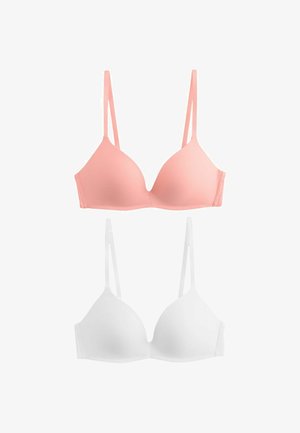 Két sima, enyhén párnázott melltartó állítható pántokkal, az egyik lágy rózsaszín, a másik fehér, fehér háttéren bemutatva.