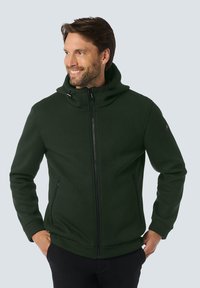 Groene geribbelde zip-up hoodie met een hoge kraag, voorzien van twee zijzakken en verstelbare koordjes, gemaakt van een gestructureerde stof.
