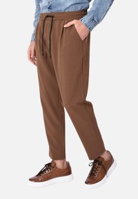 Ciabalù Pantaloni - marrone