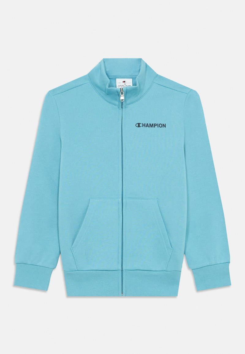 Világoskék, cipzáros pulóver magas gallérral, két elülső zsebbel és logóval a bal mellrészen. Puha, texturált anyagból készült.