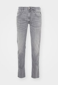 Grå denimjeans med rak passform, fem fickor och subtila slitningar. Har dragkedja och metallknappstängning.