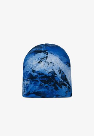 Blue beanie hat featuring a mountain and wave pattern, made from soft, stretchy fabric. Logo displayed on the side.