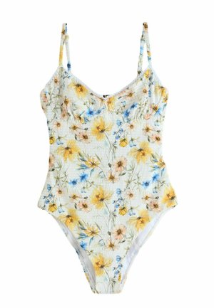 Jednodielne plavky s tenkými ramienkami a textúrovanou látkou, s motívom žltých, modrých a broskyňových kvetov na bielom pozadí.