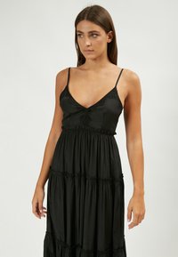 INFLUENCER Maxikleid - black