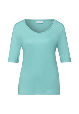 Chemisier pour femmes bleu clair à manches courtes avec encolure dégagée et poignets de manches repliés, présenté sur un fond blanc.