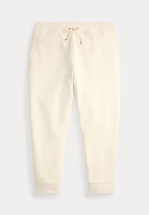 Pantaloni jogger casual color crema con tasche frontali, vita elasticizzata e coulisse, mostrati distesi su uno sfondo chiaro.