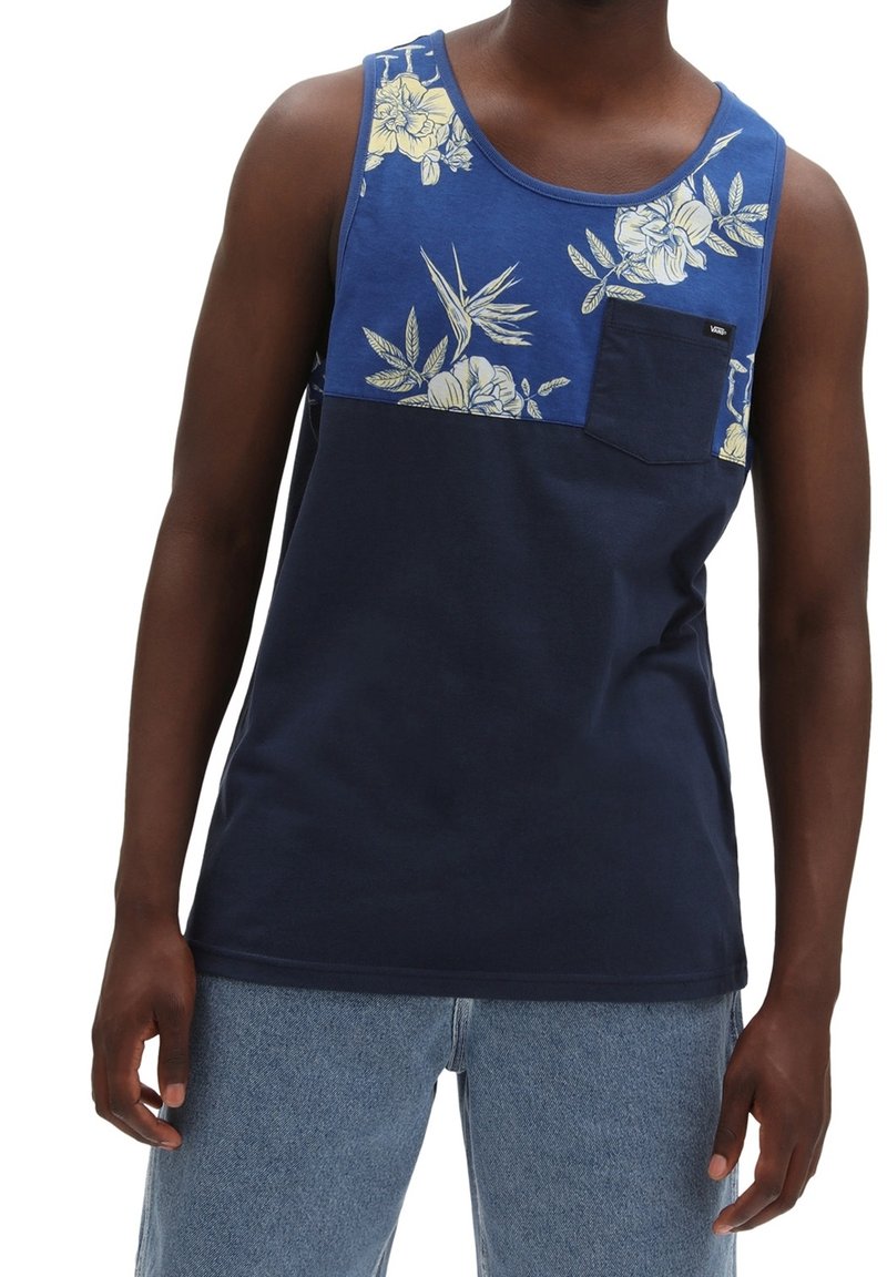 Débardeur bleu marine avec impression florale jaune sur la partie supérieure, doté d'une poche sur le côté gauche et d'une texture en coton lisse.