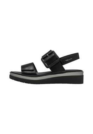 Black leather platform sandals with a wide strap and adjustable buckle. Features a contoured footbed and textured rubber sole.
