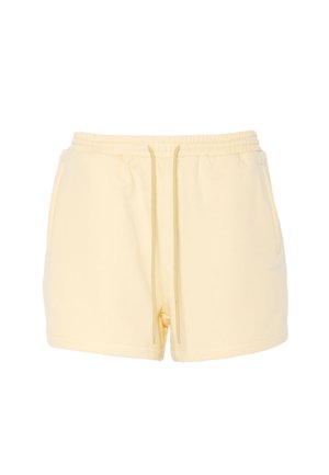 Lysegule bomuldsshorts med elastik i taljen, snøre foran og sidelommer, vist mod en hvid baggrund.