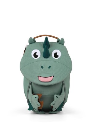 Green dinosaur-shaped backpack with cartoon eyes, two horns, small ears, and front pocket designed as arms and legs.