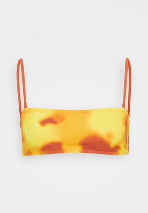 Yellow and orange tie-dye bikini top with thin orange straps, ribbed texture, and seamless design. No additional hardware or accents.