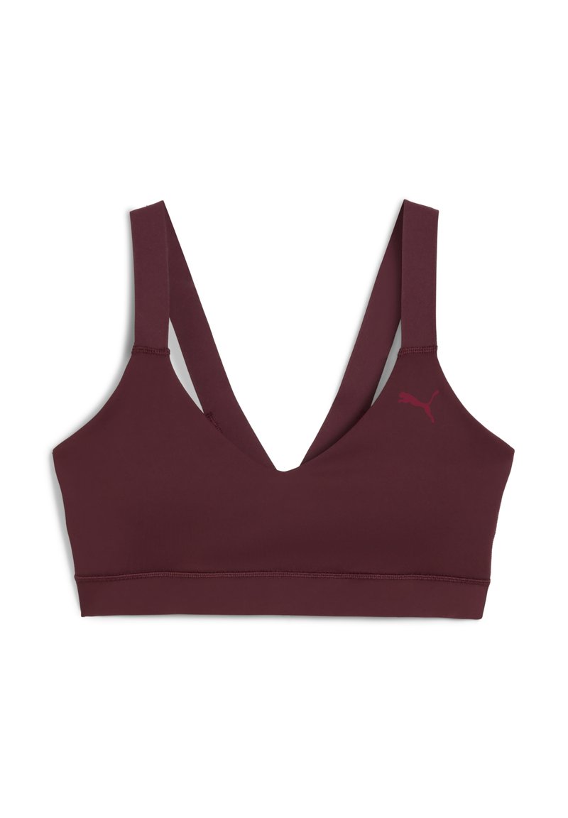 Kestenjasti sportski bralette s V-izrezom, širokim naramenicama i malim logom. Izrađen od glatkog, elastičnog materijala za udobnost.