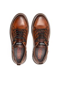 Chaussures en cuir marron avec des lacets noirs, bout arrondi et zip sur le côté. Semelle intérieure texturée avec logo, coutures contrastantes et semelle en caoutchouc robuste.