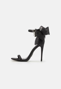 Steve Madden NIKOLE - Sandaalit nilkkaremmillä - black