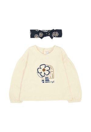 Chemise longue crème à manches longues avec un motif floral bleu et un bandeau marine à motifs floraux ; tissu doux, manches bouffantes et encolure arrondie.