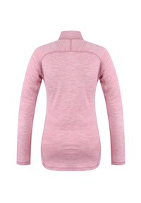 Long-sleeve top in light pink, made from a textured fabric with a mock collar and flatlock seams, featuring a slightly curved hem.