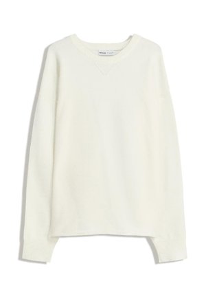 Cream-colored knit sweater with a V-neck, long sleeves, and ribbed cuffs. The fabric appears soft with a smooth texture.