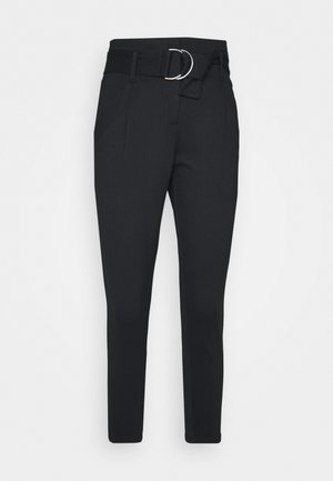 Black tailored pants featuring a fitted design, flat front, two side pockets, and a silver circular buckle belt accent.