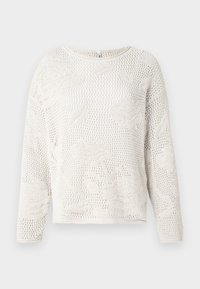 Pull en maille beige clair à coupe ample, présentant un motif texturé à tissage ouvert et des manches longues. Encolure arrondie et longueur raccourcie.