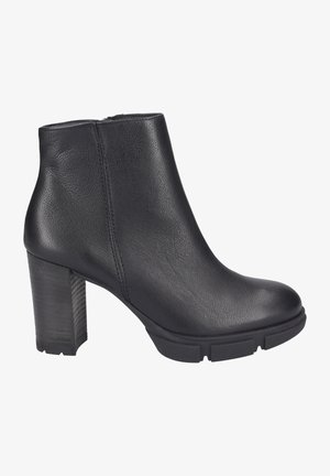 Stivale alla caviglia in pelle nera con tacco a blocco e cerniera laterale, suola texture per presa e punta rotonda liscia.