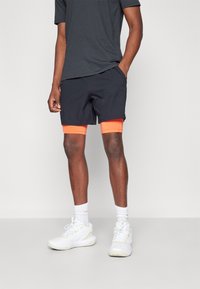 Under Armour VANISH WOVEN - 2-in-1 shorts - black/fire/pitch gray