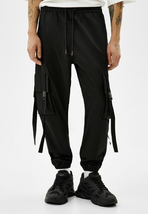 WITH STRAP DETAILS - Cargo trousers - black