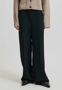 Second Female CLASSIC - Hlače - black