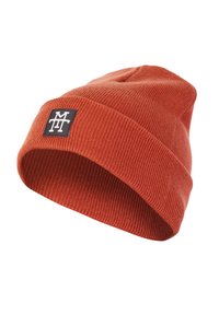 Knitted beanie in burnt orange with a ribbed texture. Features a black rectangular patch with white logo detailing on the front.
