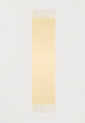 Écharpe rectangulaire jaune clair avec des franges aux deux extrémités courtes, présentée à plat sur fond blanc.