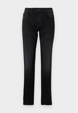 Jeans de mezclilla negra con corte recto, bolsillos frontales y cierre de un solo botón. Presentan un ligero desvanecimiento y detalles de costura.