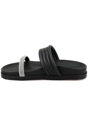 Zwarte slide-sandalen met twee dikke bandjes en een met kristallen versierde band. Voorzien van een platte zool en een gestructureerde voetbed voor comfort.