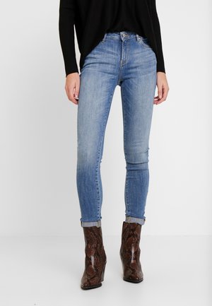 Vaqueros pitillo - blue denim