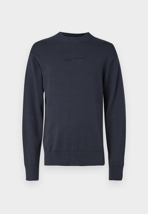 Navy knit sweater with a crew neckline, ribbed cuffs and hem, featuring embossed logo text on the chest; smooth, soft texture.