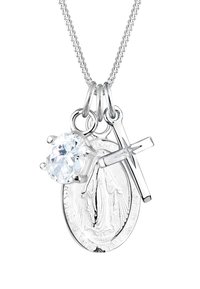 Silver necklace featuring a circular pendant, a cross charm, and a large, clear stone, all suspended from a delicate chain.