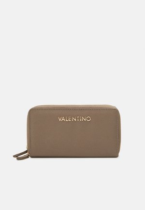 Brown leather wallet with a textured finish, gold "VALENTINO" logo on the front, and zip closure. Compact design.