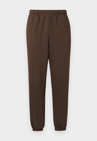 Καφέ φόρμες με ελαστική μέση, στενά λάστιχα στους αστραγάλους και απαλό ύφασμα. Χωρίς τσέπες ή διακοσμητικά, σχεδιασμένες για άνεση και ευκολία.