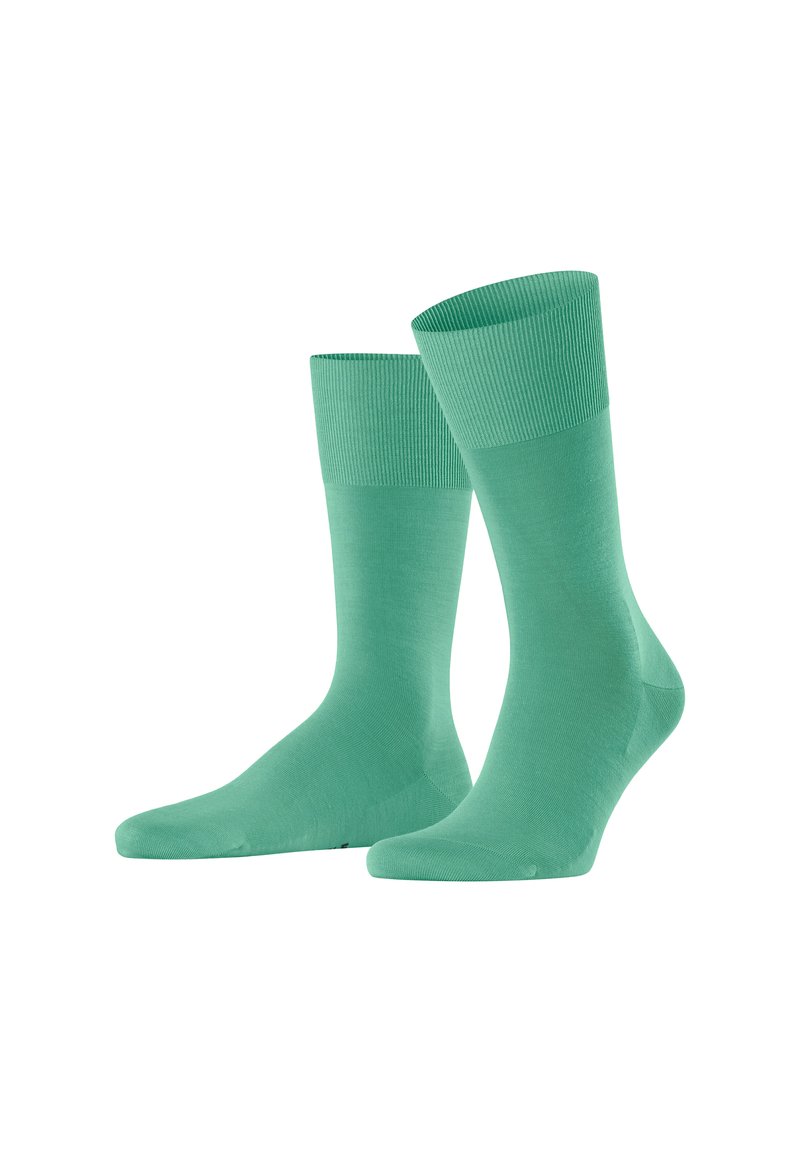 Mintgrüne Socken aus weichem Baumwoll-Mix, mit einem gerippten Bündchen und glatter Textur, im Design einer mittellangen Variante bis zur Wade.