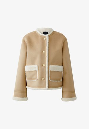 Brown jacket with a faux fur lining and trim. Features a round collar, gold buttons, and two front pockets with fur accents.