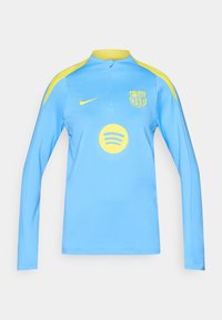 Ανοιχτό μπλε αθλητικό μπλουζάκι με μακριά μανίκια, με κίτρινο γιακά και διακοσμητικά στους ώμους. Φέρει λογότυπο και έμβλημα Spotify στο μπροστινό μέρος. Κατασκευασμένο από συνθετικό υλικό.