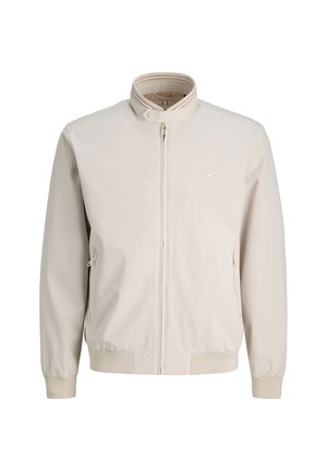 Ελαφριά μπεζ μπουφάν τύπου bomber με όρθιο γιακά, μπροστινό φερμουάρ και πλαϊνές τσέπες με φερμουάρ. Διαθέτει απαλή υφή υφάσματος και ριμπ μανσέτες.