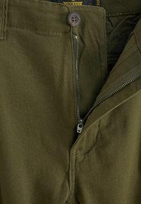 Next SLIM FIT STRETCH - Cargohose - green