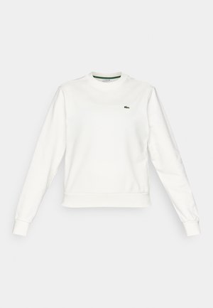 Sweatshirt branco com decote redondo, mangas longas, punhos e bainha canelados, apresentando um pequeno logótipo de crocodilo verde no lado esquerdo do peito.