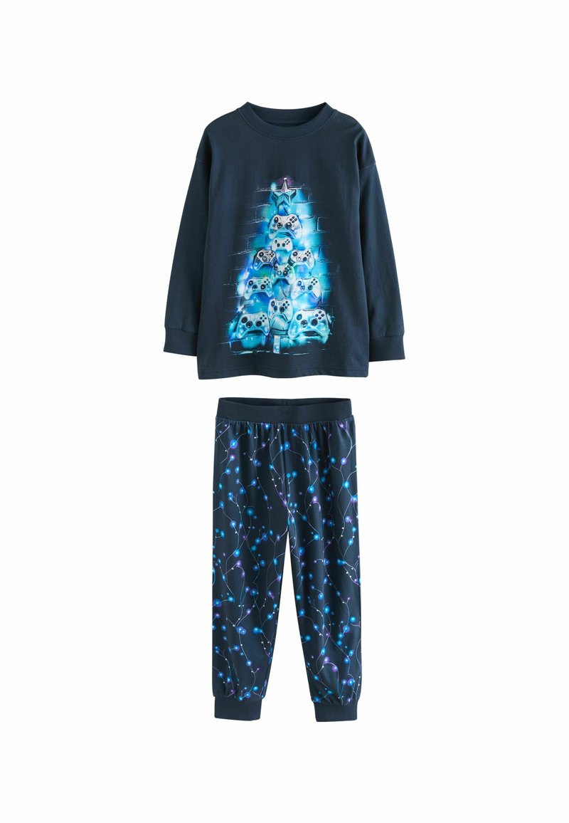 Children's navy blue pajamas with a graphic of video game controllers arranged as a glowing Christmas tree and matching pants with blue light patterns.