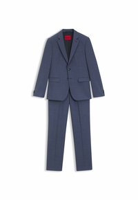 Completo blu navy caratterizzato da una giacca su misura con revers e pantaloni abbinati, realizzato in tessuto morbido con un motivo sottile.