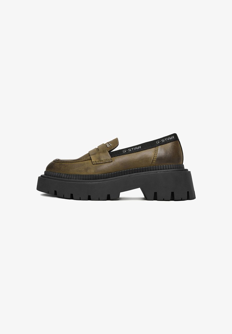 G-Star khaki loafers s hrubou čiernou gumovou podrážkou, hladkým koženým zvrškom a elastickým remienkom na členku s logom.