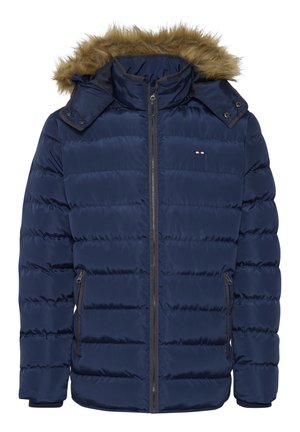 Navy blue puffer jacket with fur-lined hood, zippered front, and side pockets. Features quilted design and contrasting trim details.