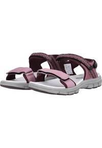 Rosa och vinröda justerbara sandaler med säkra remmar, vadderad innersula och texturerad sula. Idealiska för avslappnad utomhusbruk.