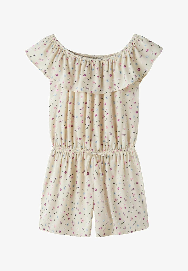 Κρεμ ολόσωμη φόρμα με λουλούδια και ανοιχτούς ώμους, ελαστική μέση και βολάν στο ντεκολτέ, με μικρά ροζ, μπλε και μωβ λουλούδια.